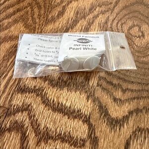 Car INFINITI Pearl White World Famous Bumper Plugs